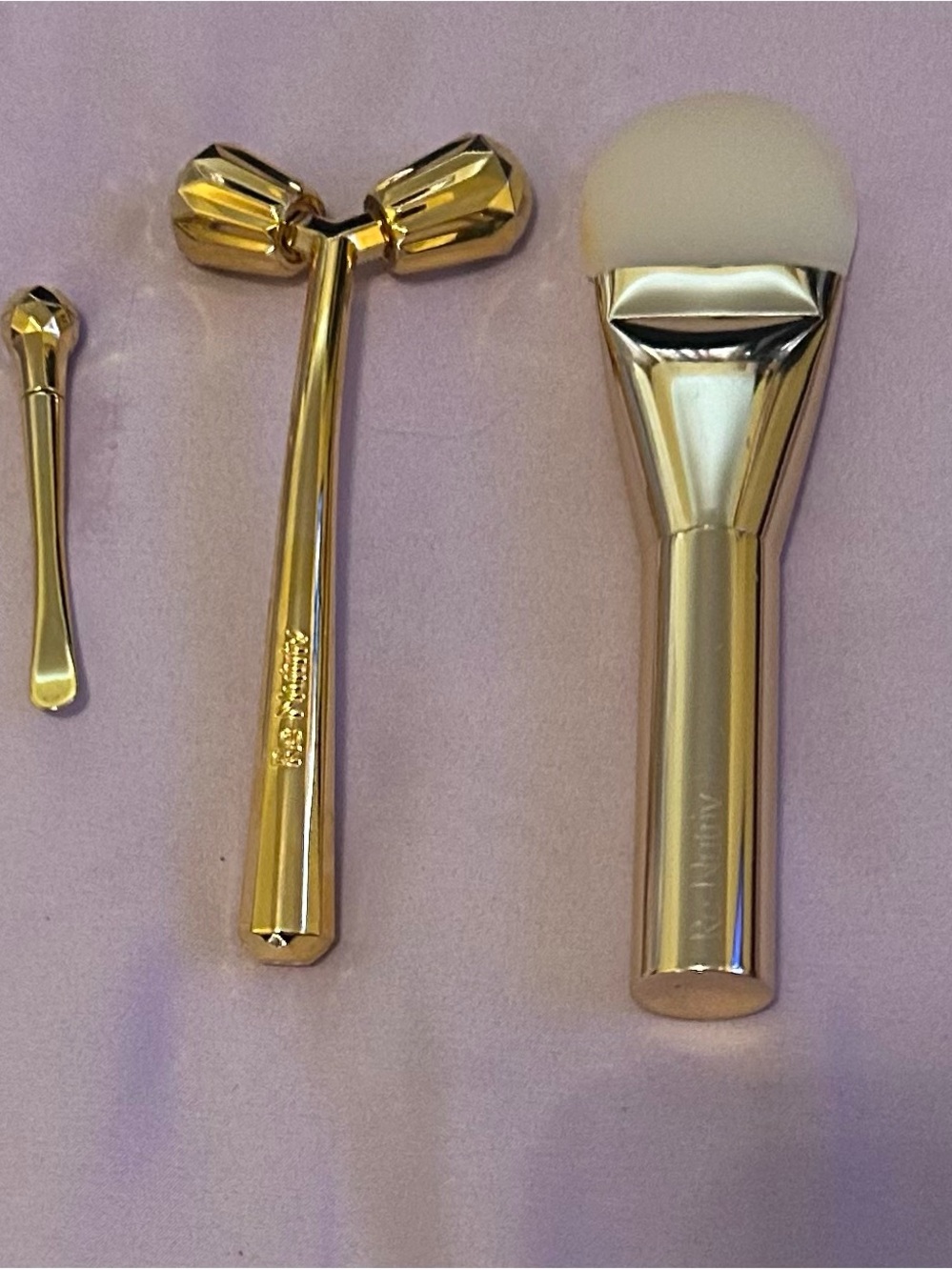 Estée Lauder Gold Re-Nutriv Facial Massager